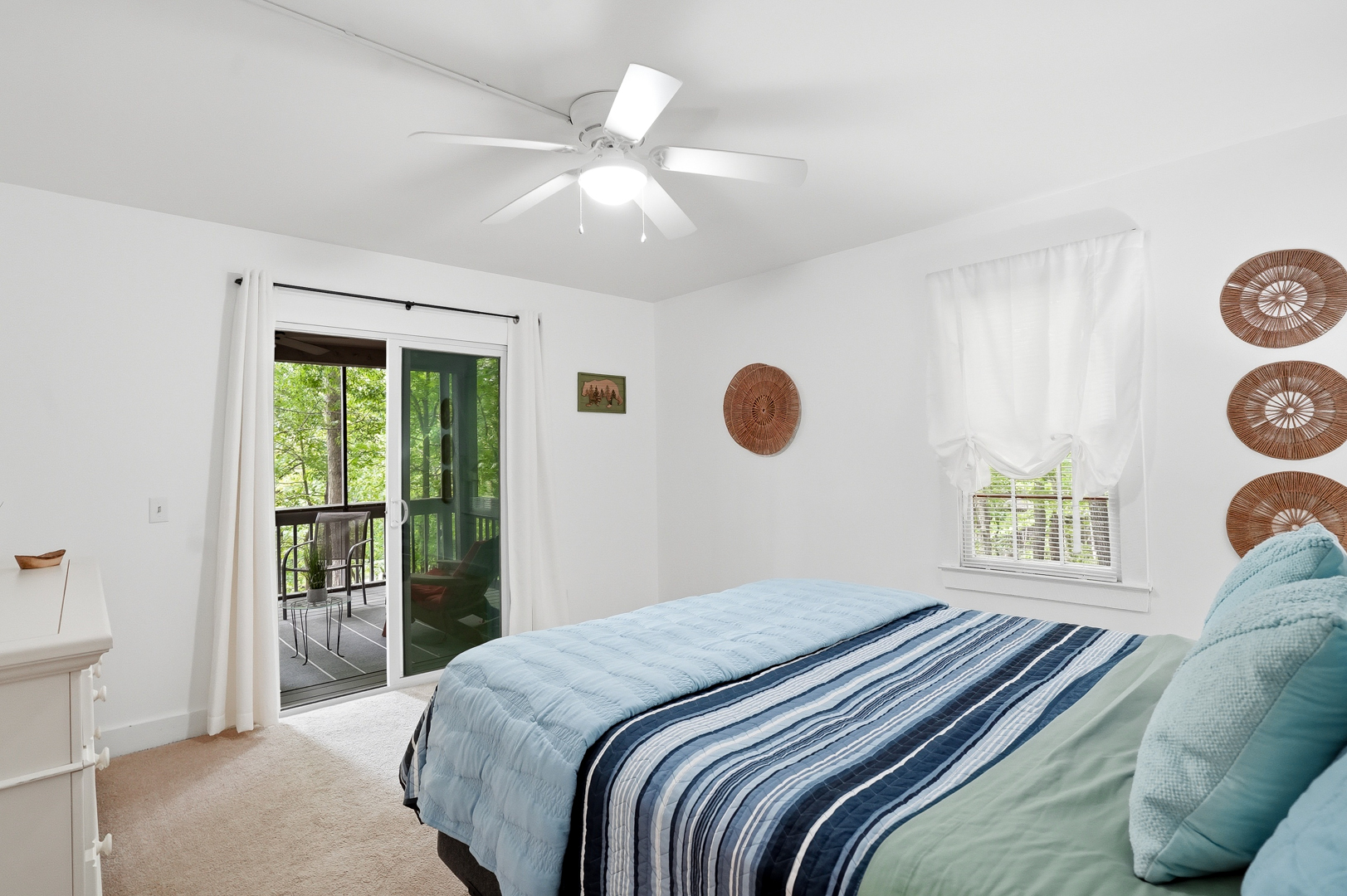 Queen bedroom with balcony door